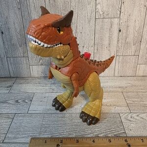 Jurassic Park Orange and Brown Dinosaur Toy